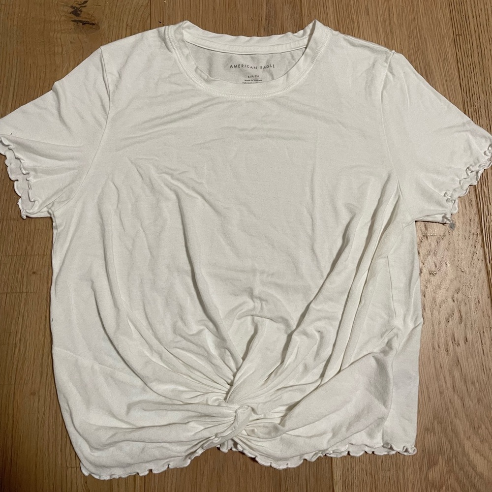 american eagle outfitters white t shirt with a tie in the front.